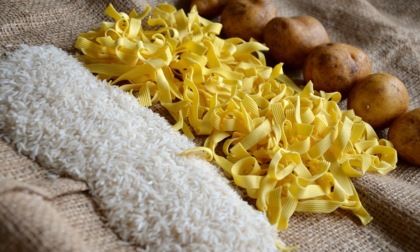 Italiani a tavola: vola il riso, calano i consumi di pane e pasta