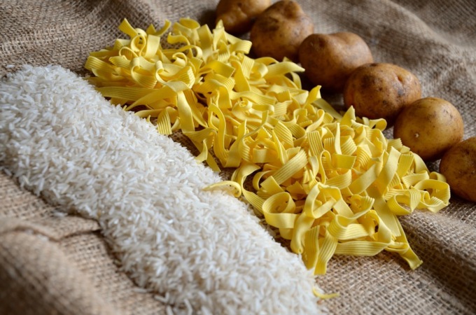 Italiani a tavola: vola il riso, calano i consumi di pane e pasta