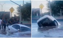 Auto finisce in una voragine piena d'acqua: donna estratta viva prima di annegare