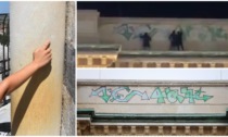 Ancora monumenti vandalizzati: graffito sulla Galleria di Milano e incisione sulla Torre di Pisa