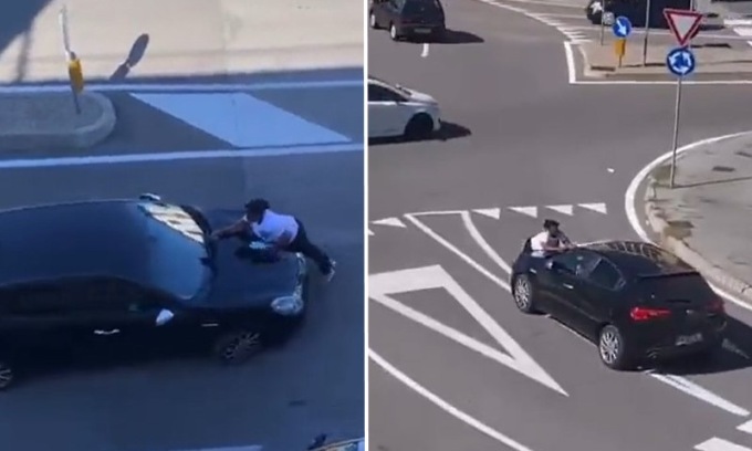 Non si ferma dopo l’incidente, l’altra automobilista si aggrappa al cofano e viene portata via: il video